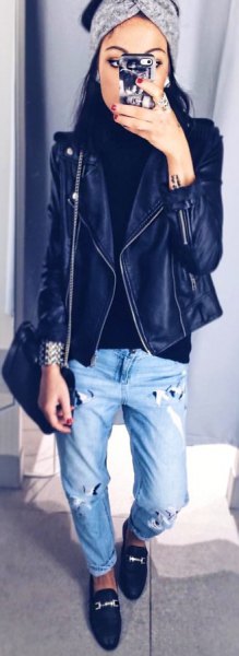black leather jacket with boyfriend cuff jeans and royal blue loafers