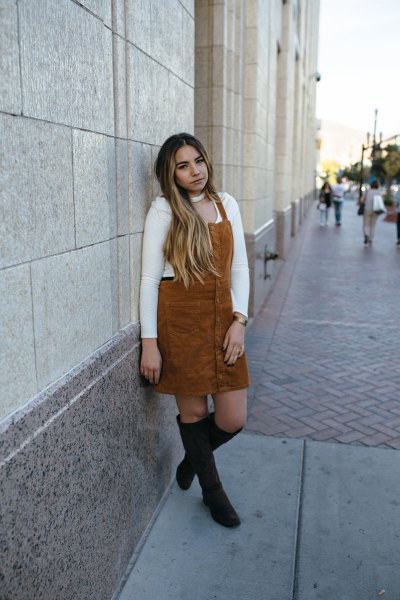 brown corduroy midi dress with white sweater and black over the knee boots