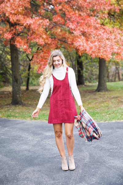 red mini cord swing dress with scoop neck and white mock neck sweater