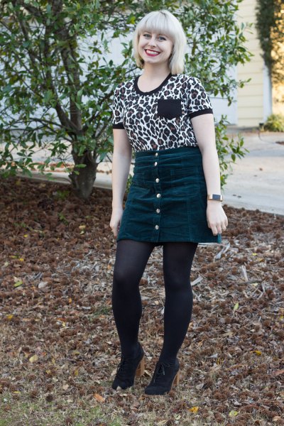 T-shirt with leopard print and mini skirt on the front