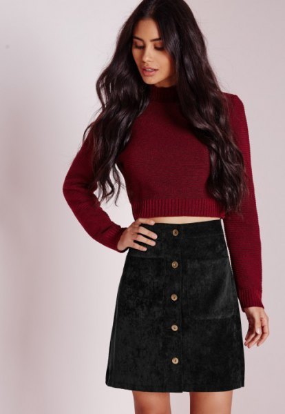 burgundy knit sweater with black cord mini skirt