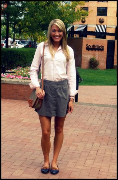 white shirt with buttons and gray mini skirt with elastic waist