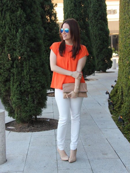 orange short sleeve blouse with white slim fit jeans
