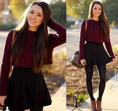 gray slim-fit sweater with a round neckline and black skater skirt with a high waist