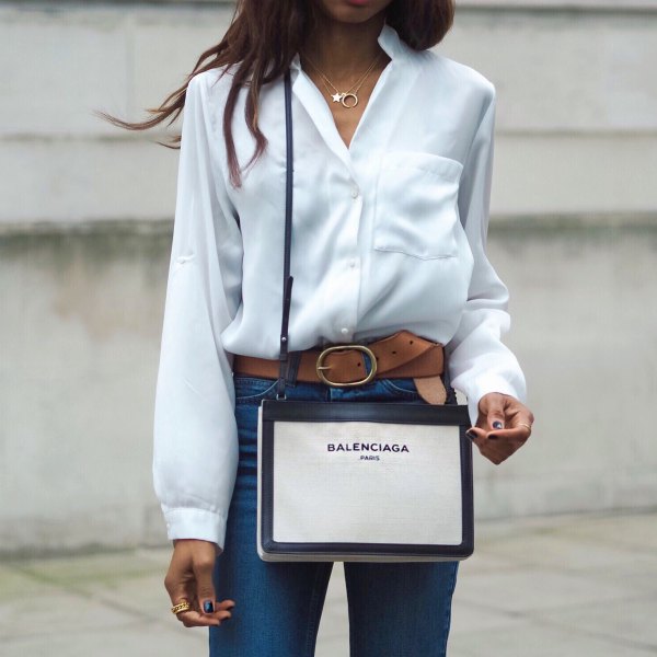 white silk shirt with buttons and blue jeans with high waist