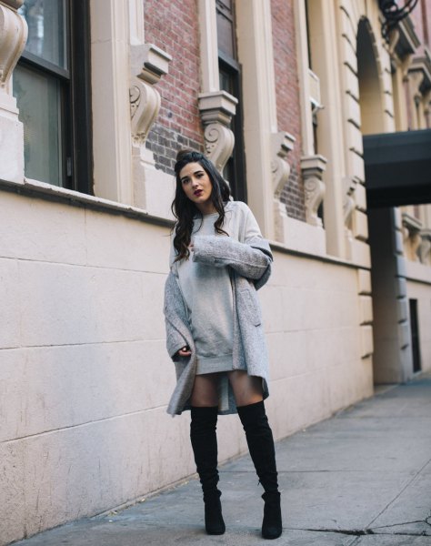 gray dress with a long wool coat and over the knee boots