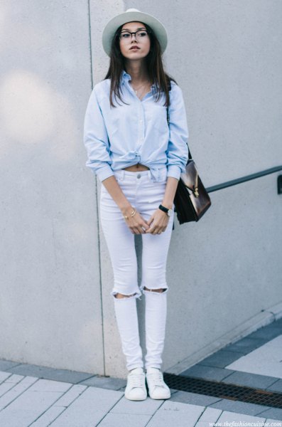 light blue knotted shirt with torn skinny jeans
