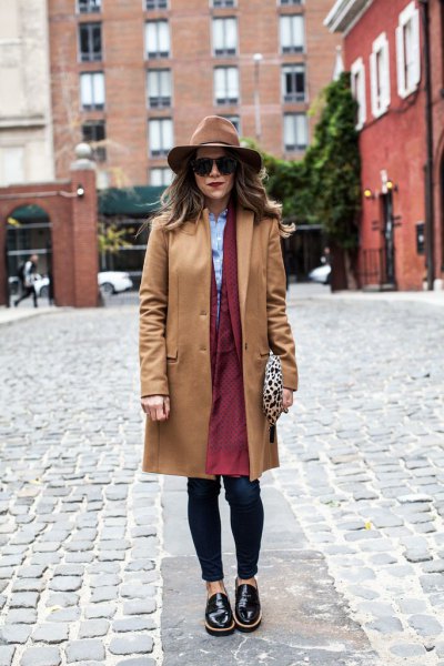 Camel hiking coat with brown longline coat dress and black leather shoes