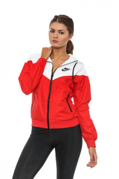 white and red windbreaker with black skinny jeans