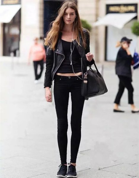 black leather jacket with bucket neck crop and slim jeans