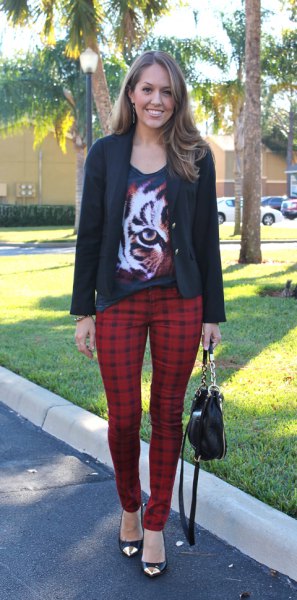 black graphic t-shirt with scoop neck with casual blazer and red checkered pants