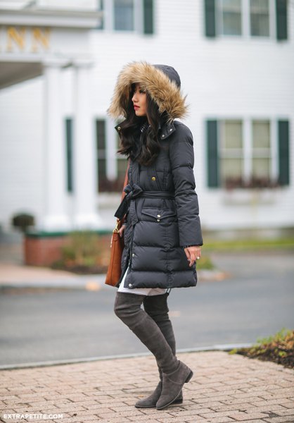black long fur coat hooded down jacket with white tunic dress