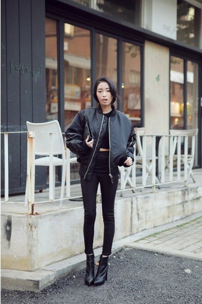 black crop top with skinny ankle jeans and leather fly jacket