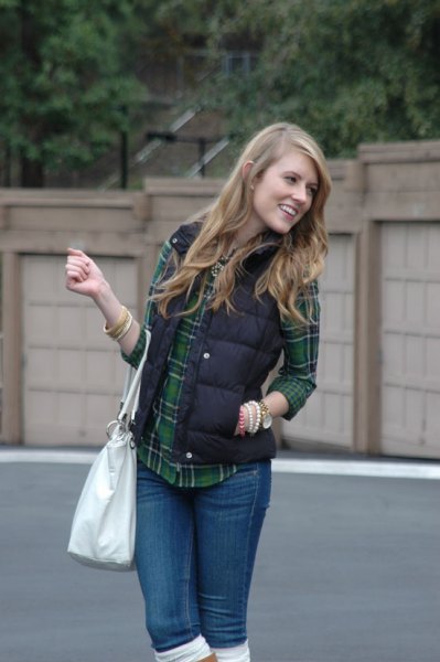 black quilted vest with gray and navy checkered boyfriend shirt
