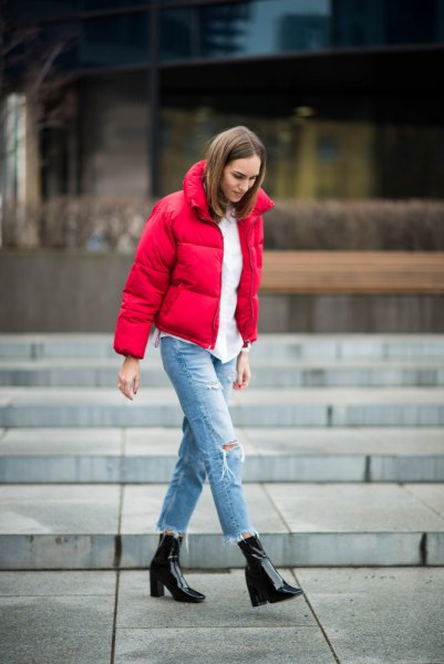 red puffer jacket with white blouse and boyfriends