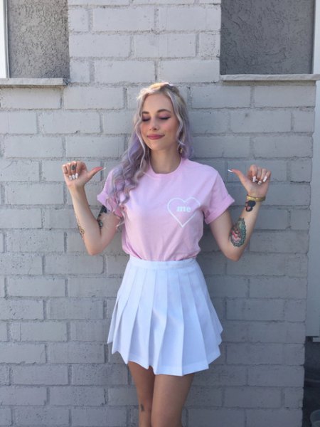 pink cuffed short sleeve tee with white pleated skater mini skirt