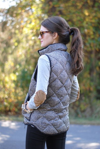 gray quilted long down vest with patch elbow white top