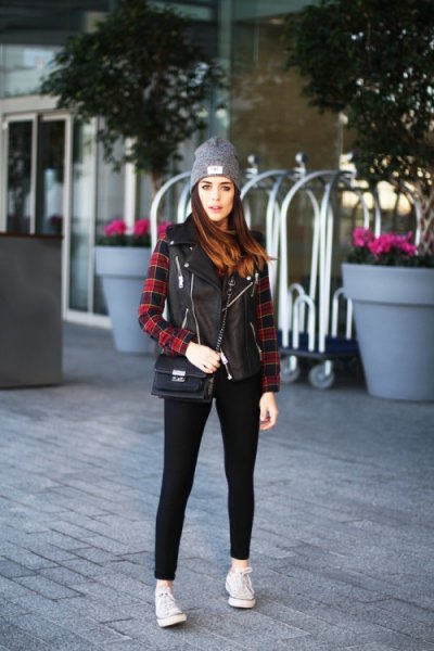red and black checkered shirt with leather jacket