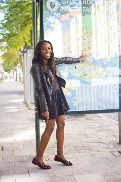 dark gray leather jacket with skater skirt and burgundy loaf