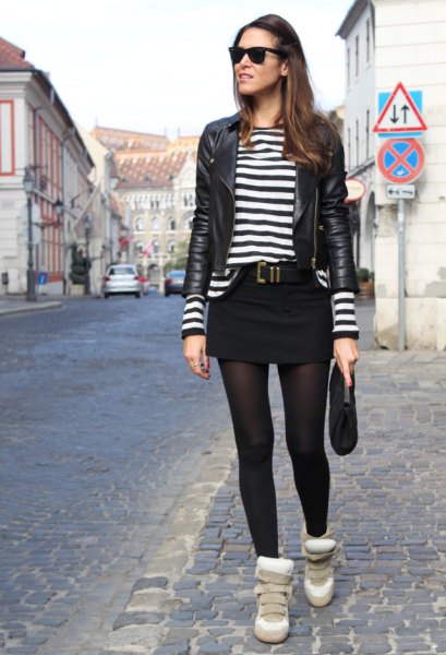 black leather jacket with striped tee and mini skirt