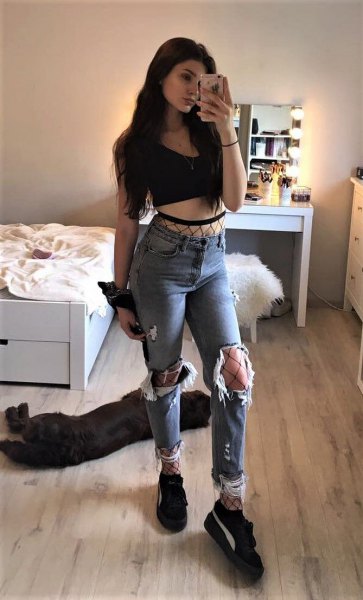 black cropped vest top with ripped boyfriend jeans and platform shoes