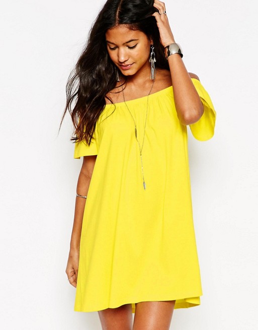 of a yellow cocktail dress