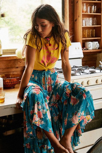yellow knotted t-shirt with blue printed airy maxi skirt