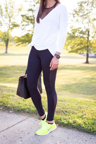 white long-sleeved T-shirt with V-neck and black, semi-transparent tank top