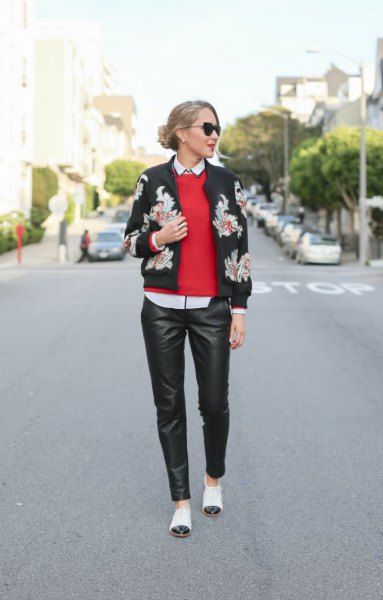 black bomber jacket, red knitted sweater and white toe shoes