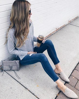 Knitted sweater with dark blue skinny jeans and gray suede shoes
