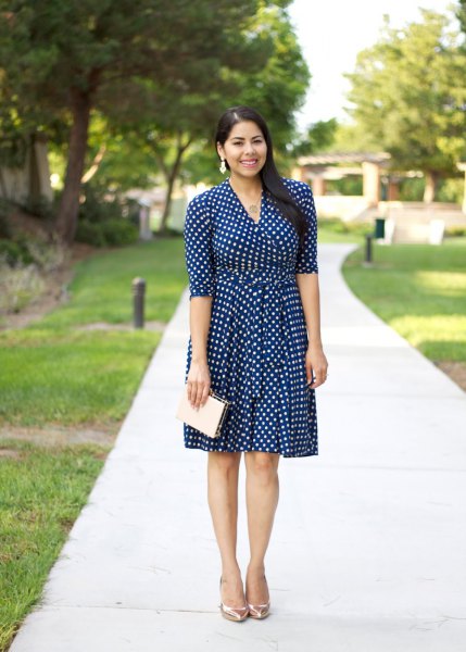 dark blue and white knee length dress with half sleeves and flap