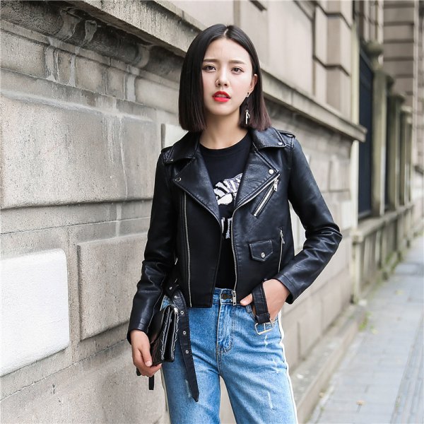 black short leather jacket with printed t-shirt and blue slim fit jeans