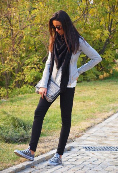 gray sweater with white t-shirt and gray canvas shoes