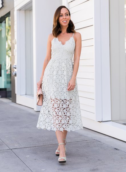 white midi flare dress with spaghetti strap and V-neck and open heels