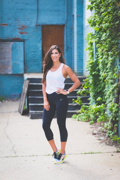 white tank top with black running trousers