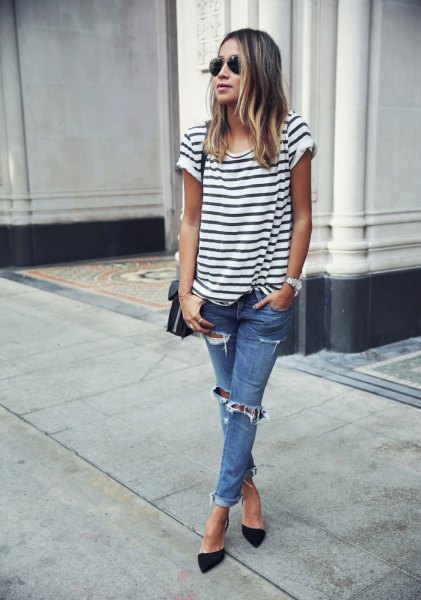 white and black striped T-shirt with blue torn jeans