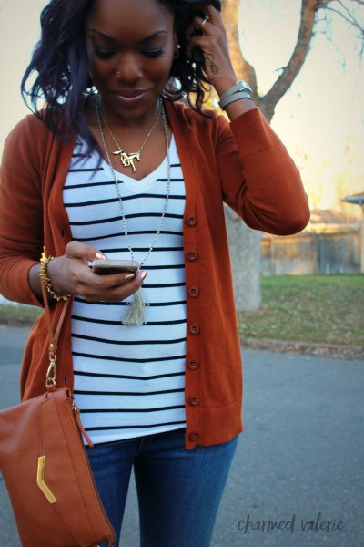 red cardigan sweater with white and black striped V-neck