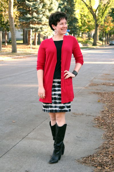 red long cardigan with black and white printed mini skirt