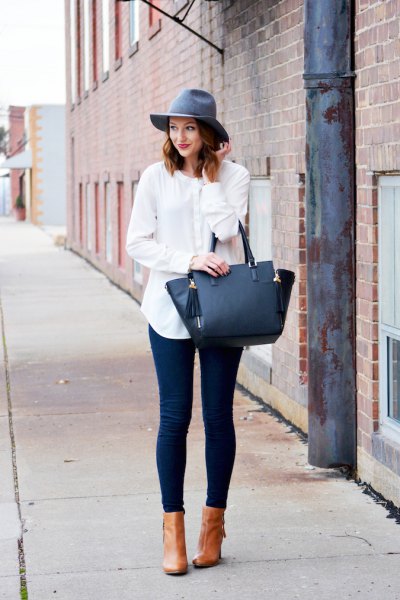 gray floppy hat with white linen boyfriend shirt and blue skinny jeans