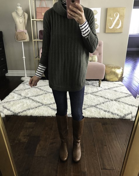 green ribbed sweater with stand-up collar and black and white striped long-sleeved T-shirt
