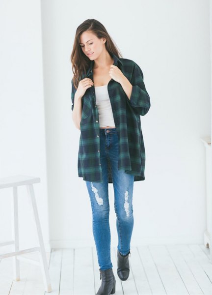 oversized dark blue flannel shirt with black leather boots
