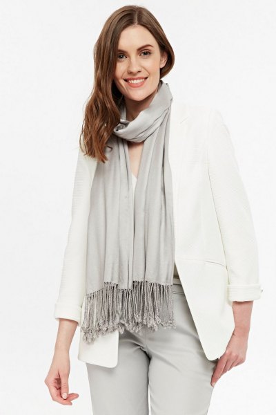 light gray fringed scarf with white oversized blazer