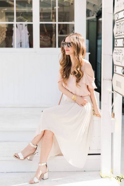 Light pink chiffon blouse with maxi-white pleated skirt and gold open toe heels
