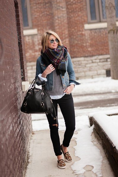 blue denim jacket with a checked scarf and canvas slip-on shoes with a leopard print