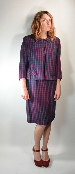 gray checked blazer with matching knee-length skirt with a straight cut