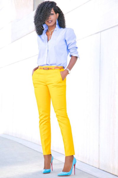light blue shirt with buttons and yellow, slim cut trousers