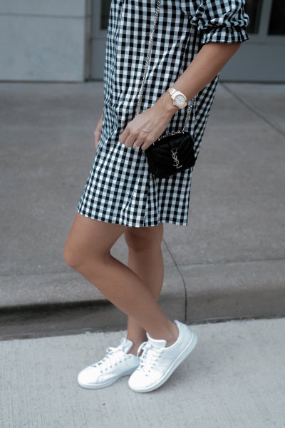 black and white checked mini shift dress with low trainers