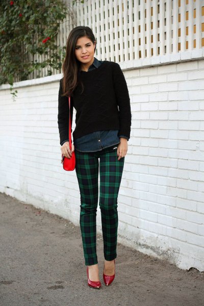 black shirt with buttons and dark blue and green checked pants