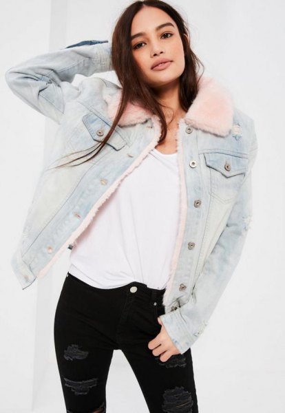 light blue denim jacket with white t-shirt and black jeans