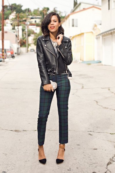 black leather jacket with dark blue and gray checked tube pants